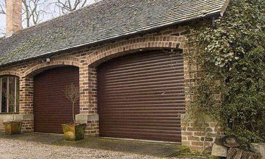 Picture of Pair of Aluroll insulated roller garage doors in Rosewood foil laminate